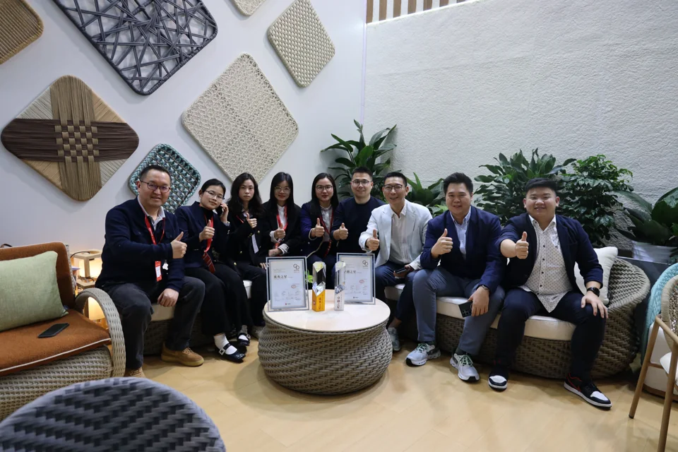 A group photograph in the furniture showroom